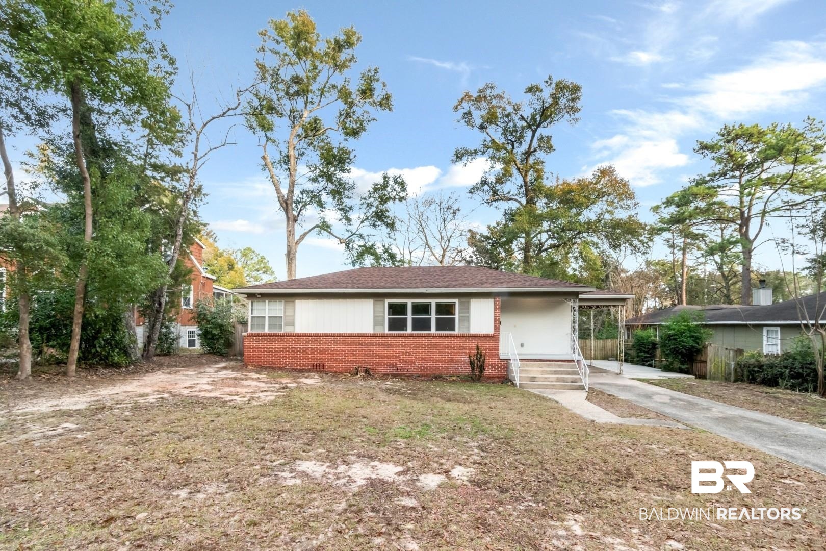 61 Nack Lane Mobile, AL 36608 - Photo 1 of 25 Ranch-style house featuring a carport