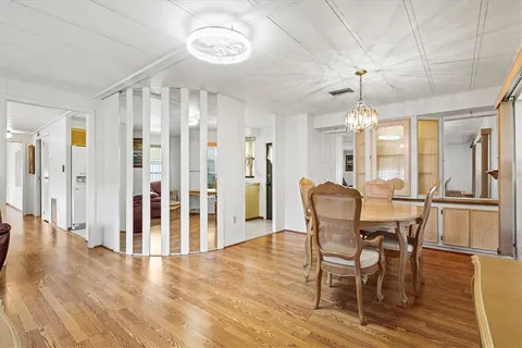 a view of a dining room with furniture