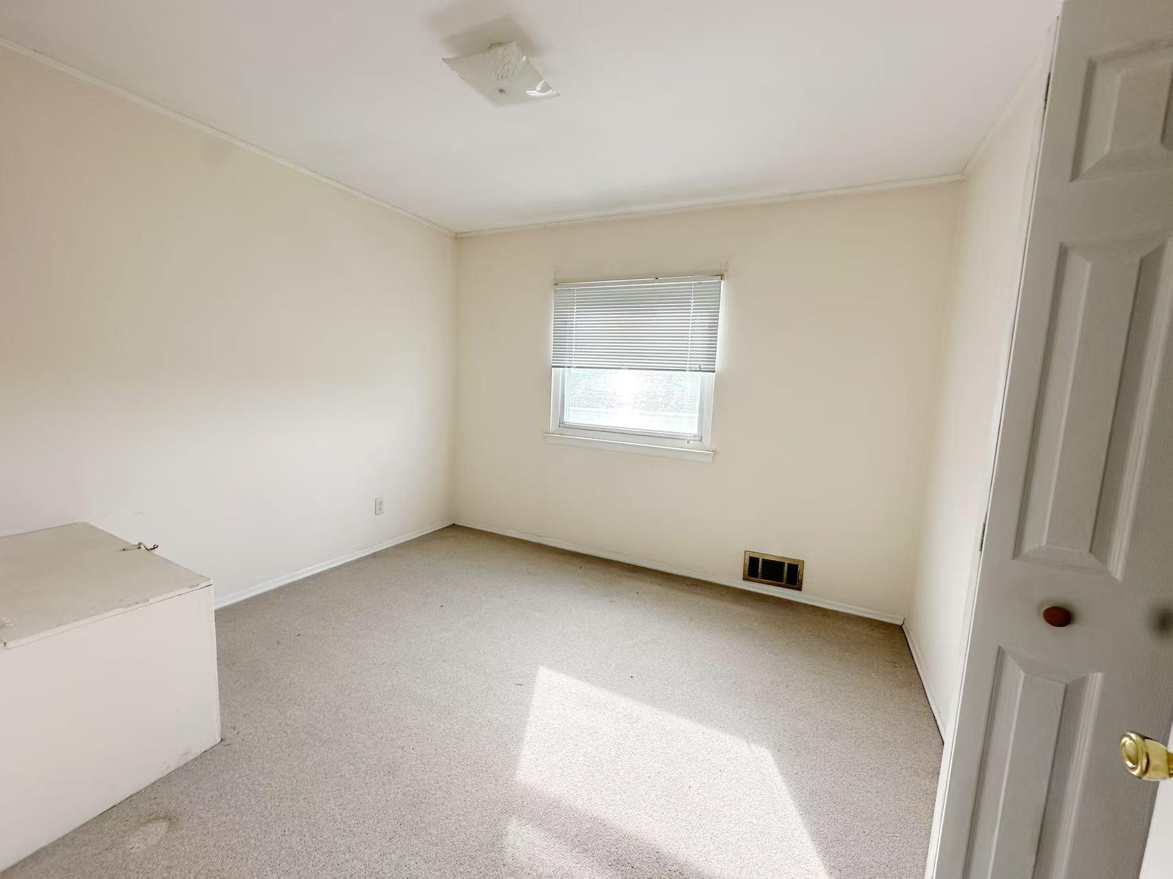 23-11 Whitestone Expressway Queens, NY 11357 - Photo 5 of 10 a view of a room that has a window in it