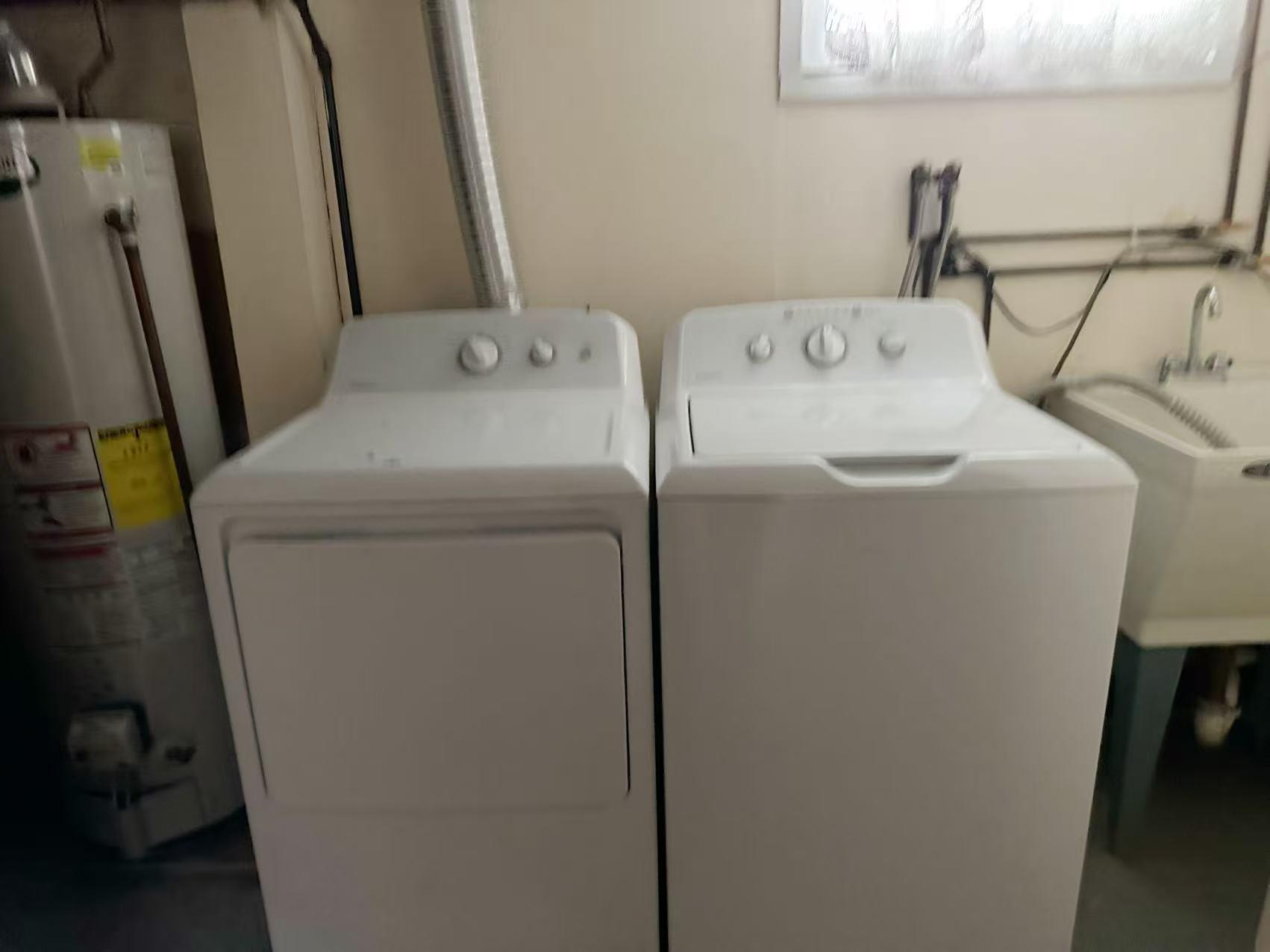 23-11 Whitestone Expressway Queens, NY 11357 - Photo 10 of 10 a utility room with dryer and washer