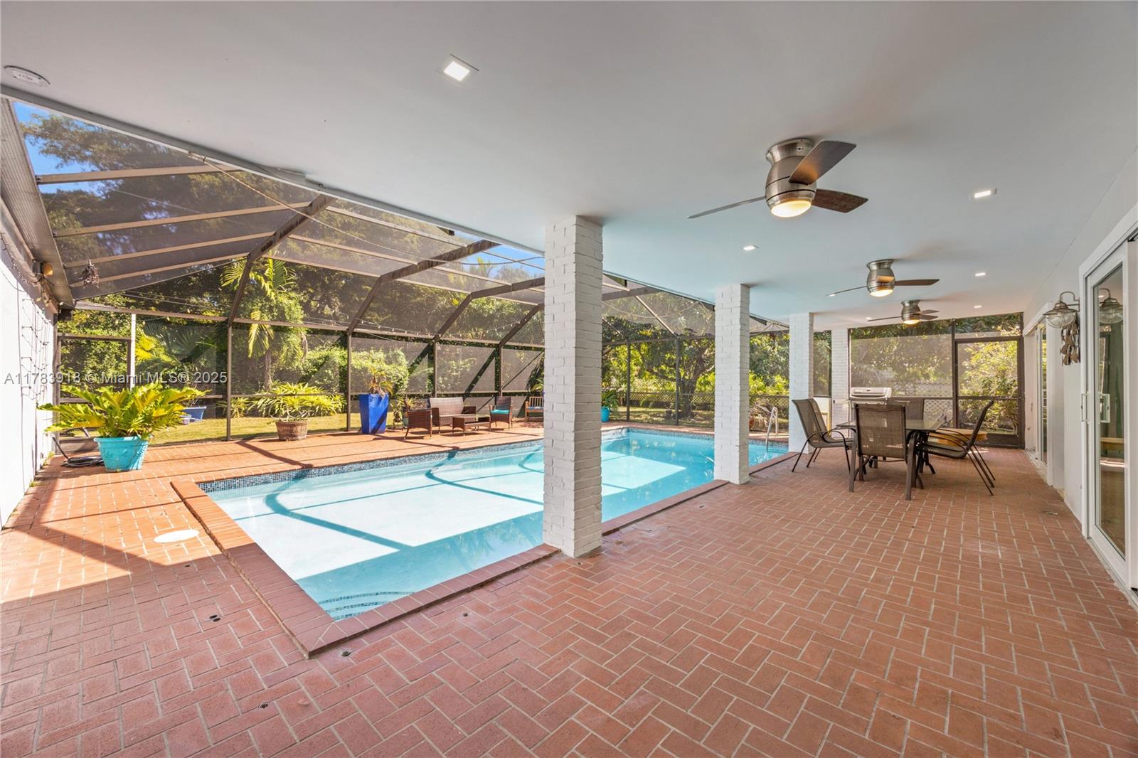 9401 Southwest 69th Court Pinecrest, FL 33156 - Photo 11 of 39 a view of a room with gym equipment