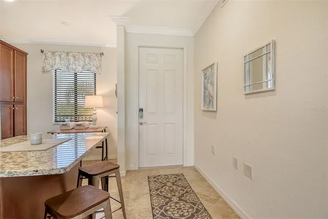 a kitchen with a stove a sink and a refrigerator