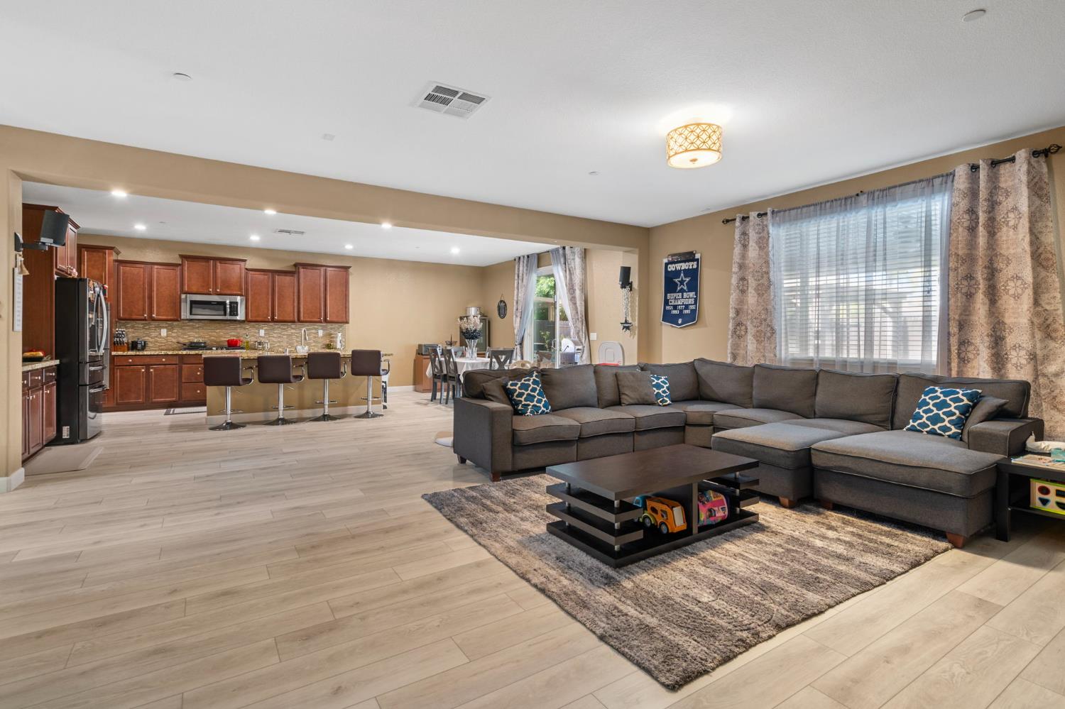 2317 Mathar Drive Manteca, CA 95337 - Photo 11 of 48 a living room with furniture and a large window