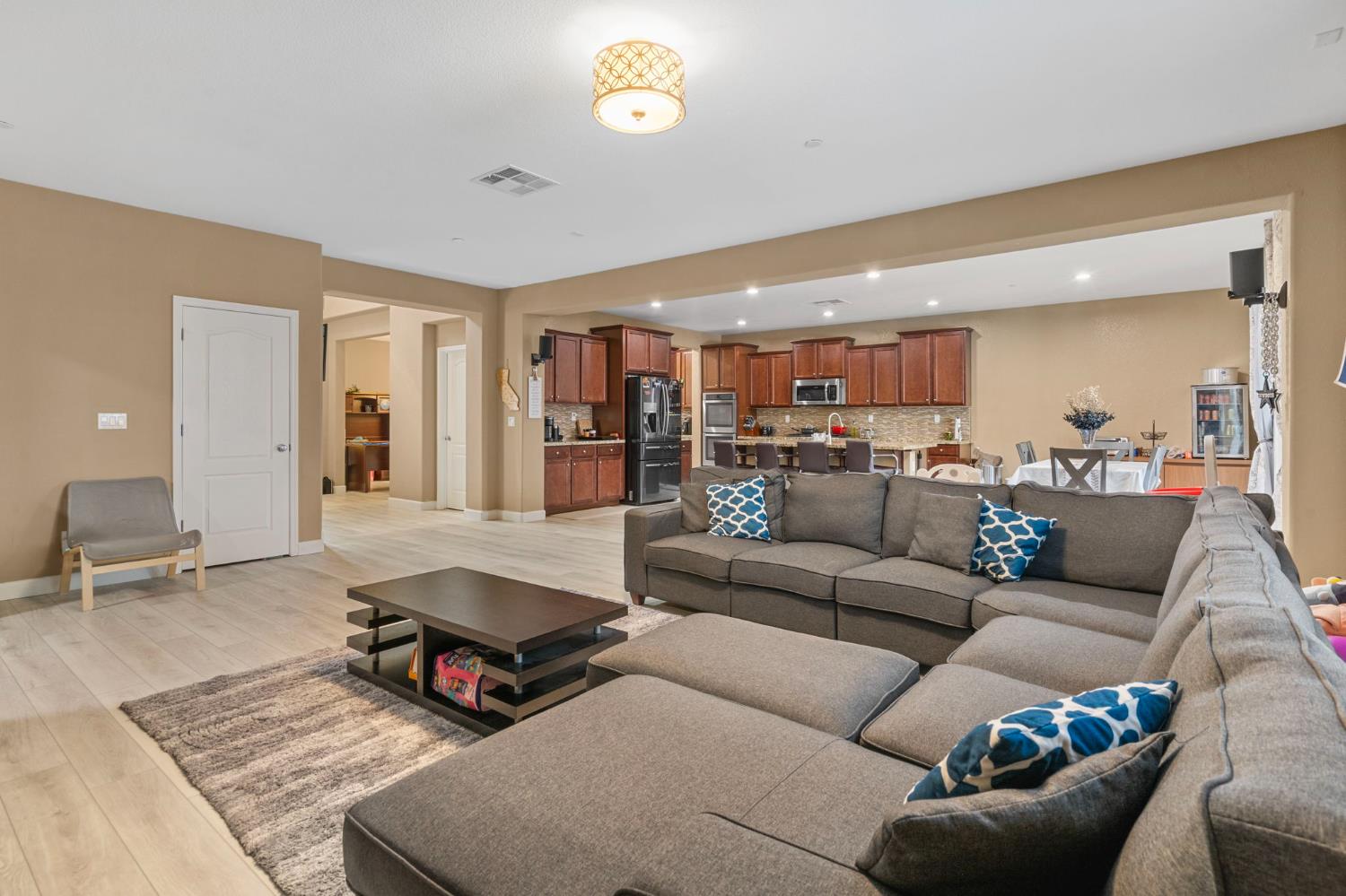 2317 Mathar Drive Manteca, CA 95337 - Photo 12 of 48 a living room with furniture and kitchen view