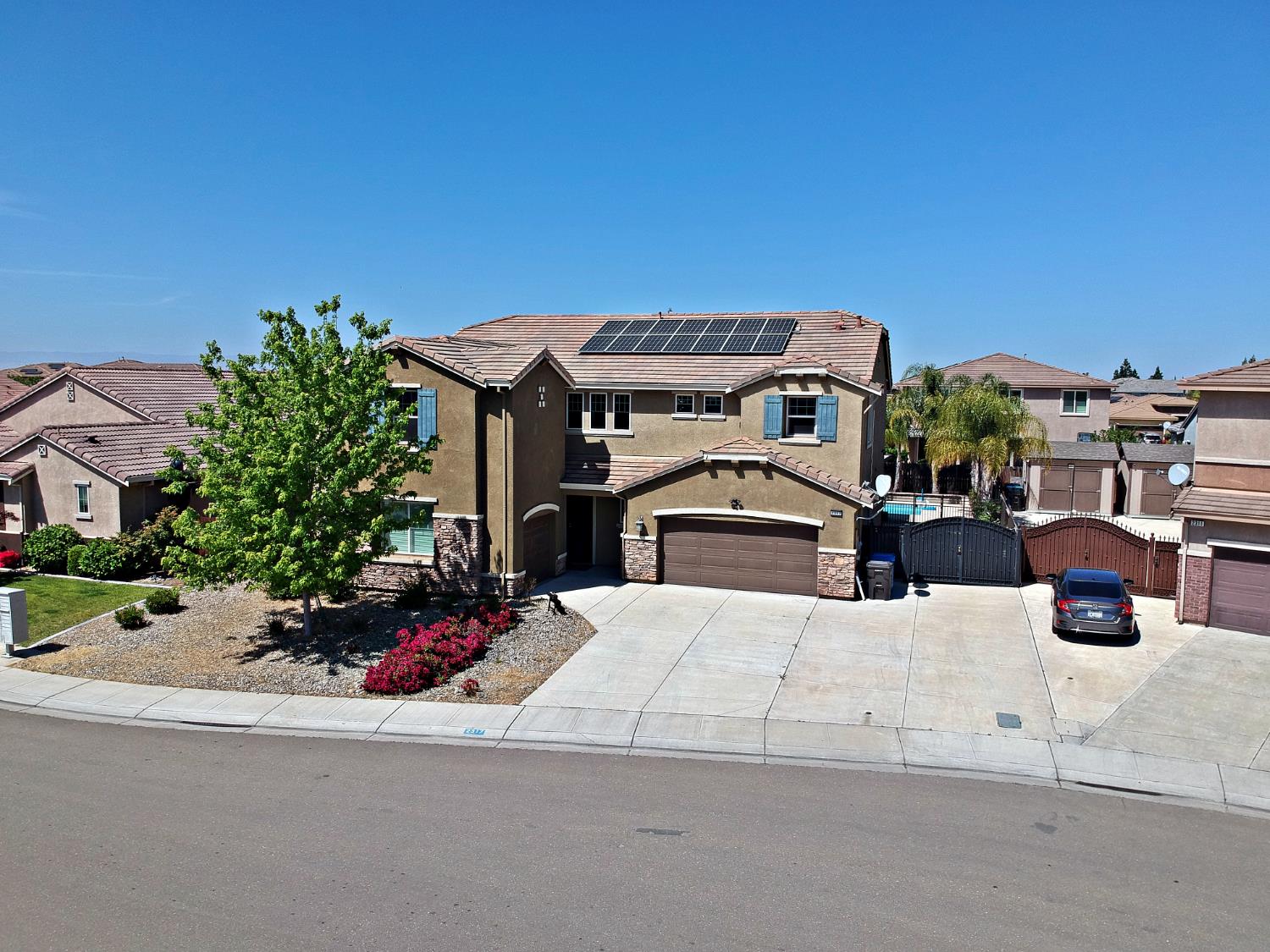 2317 Mathar Drive Manteca, CA 95337 - Photo 47 of 48 a view of a house with a street