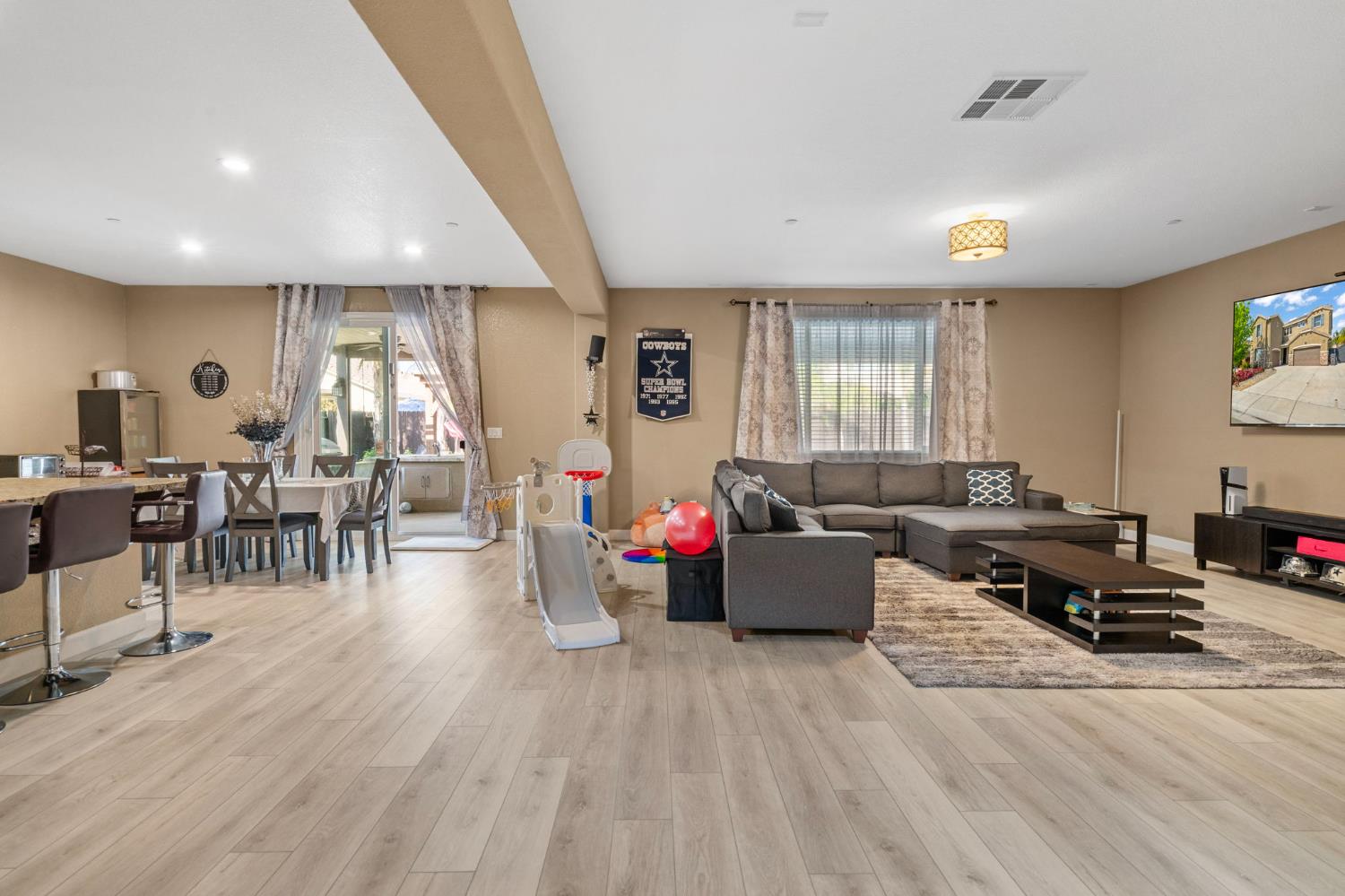 2317 Mathar Drive Manteca, CA 95337 - Photo 7 of 48 a living room with furniture and wooden floor