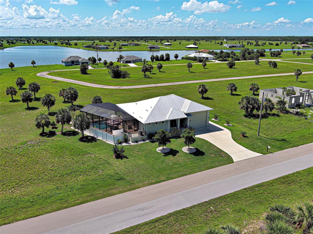 48 Lark Drive Placida, FL 33946 - Photo 1 of 1 a view of a park with large trees