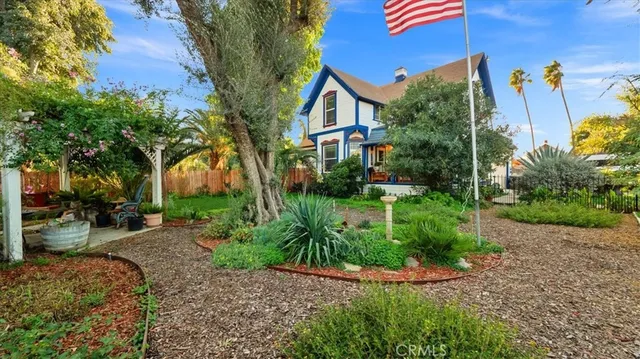 a view of a chairs and table in the patio