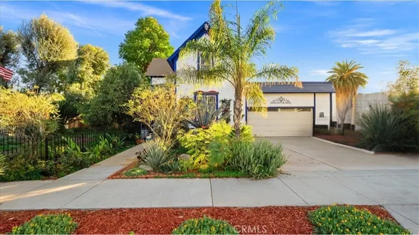 an aerial view of residential house and outdoor space