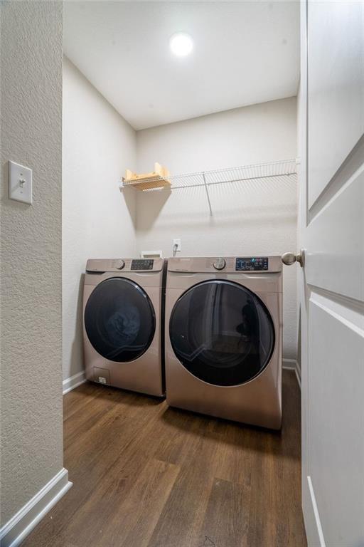 735 Walnut Creek Circle Pendergrass, GA 30567 - Photo 18 of 29 a view of a storage and utility room with two washing machine