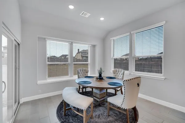 a workspace with furniture and a window