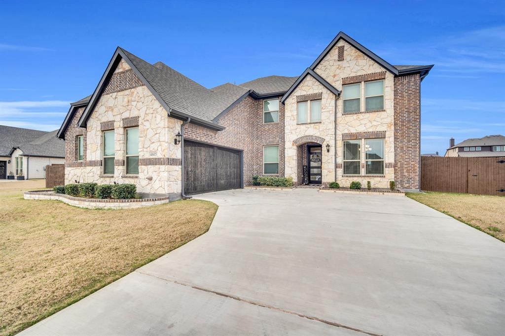 4605 Rambler Way Midlothian, TX 76065 - Photo 4 of 40 a view of a house with a yard and large tree