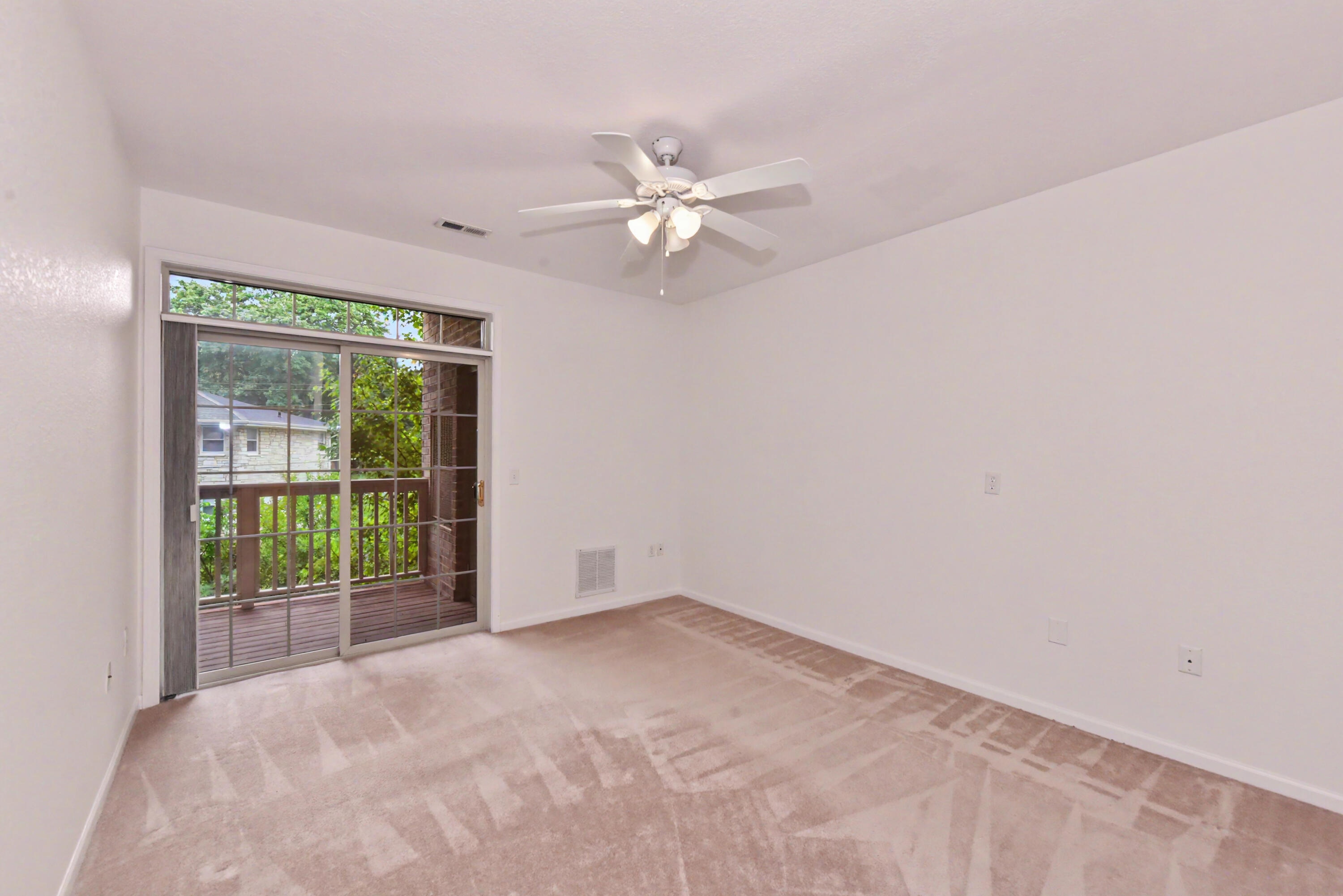 13050 West Bluemound Road, Unit 203 Elm Grove, WI 53122 - Photo 9 of 24 Primary ensuite with private balcony access