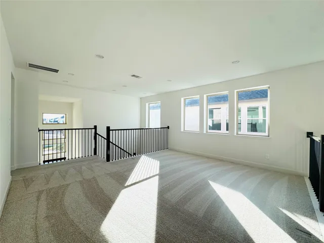 a bathroom with a bathtub shower sink mirror and toilet