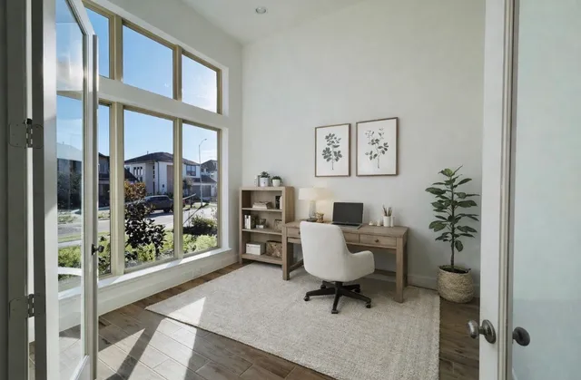 a view of an entryway with wooden floor