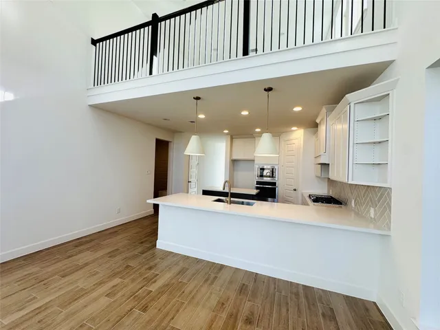 a living room with furniture fireplace and flat screen tv