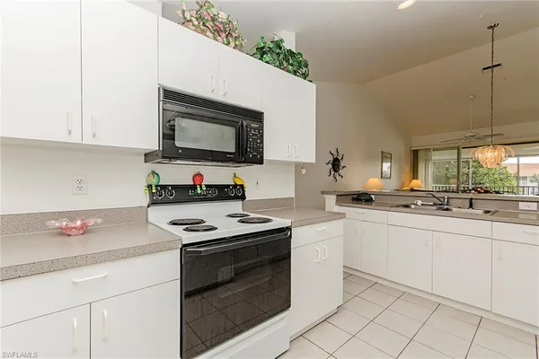 $5,500 | 4910 Deerfield Way, Unit A203, Naples, FL 34110