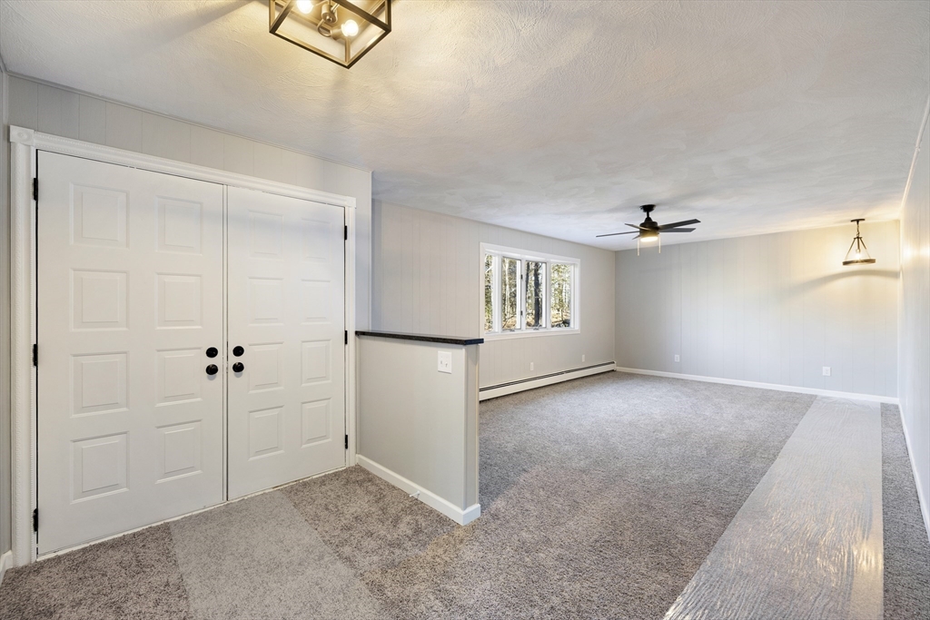 28 Long Hill Road Brookfield, MA 01506 - Photo 11 of 40 an empty room with windows and closet