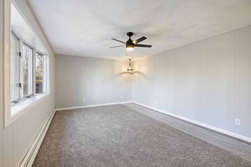 28 Long Hill Road Brookfield, MA 01506 - Photo 13 of 40 wooden floor in an empty room with a window