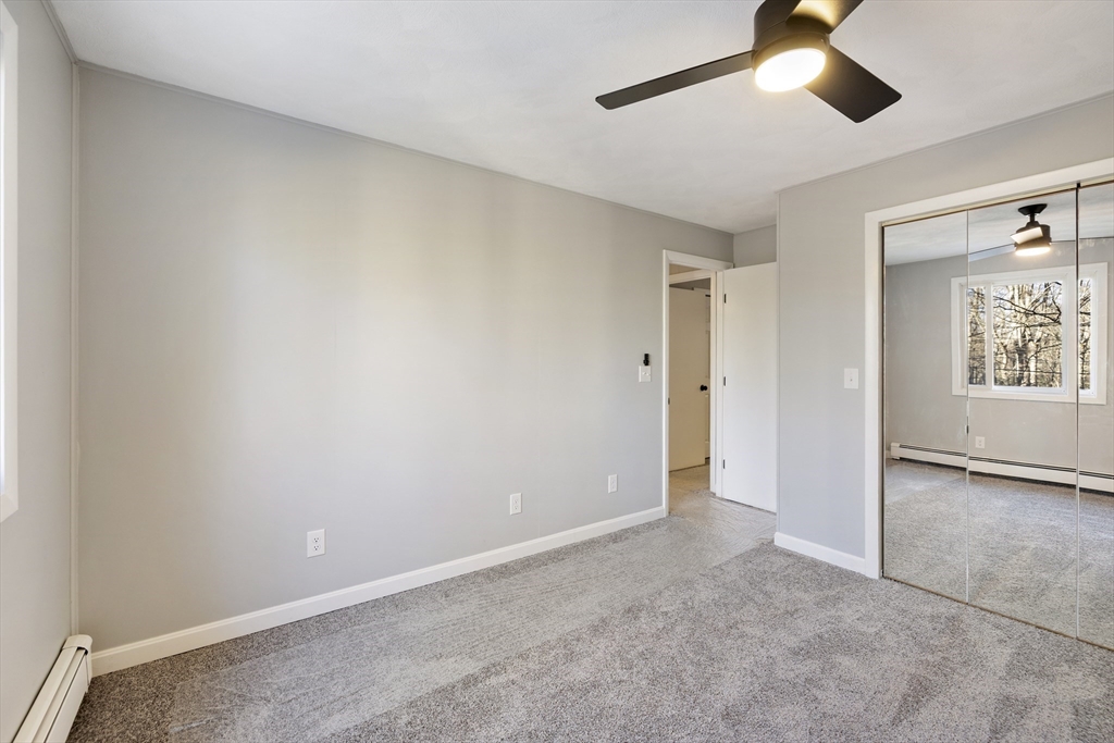 28 Long Hill Road Brookfield, MA 01506 - Photo 19 of 40 an empty room with windows and fan