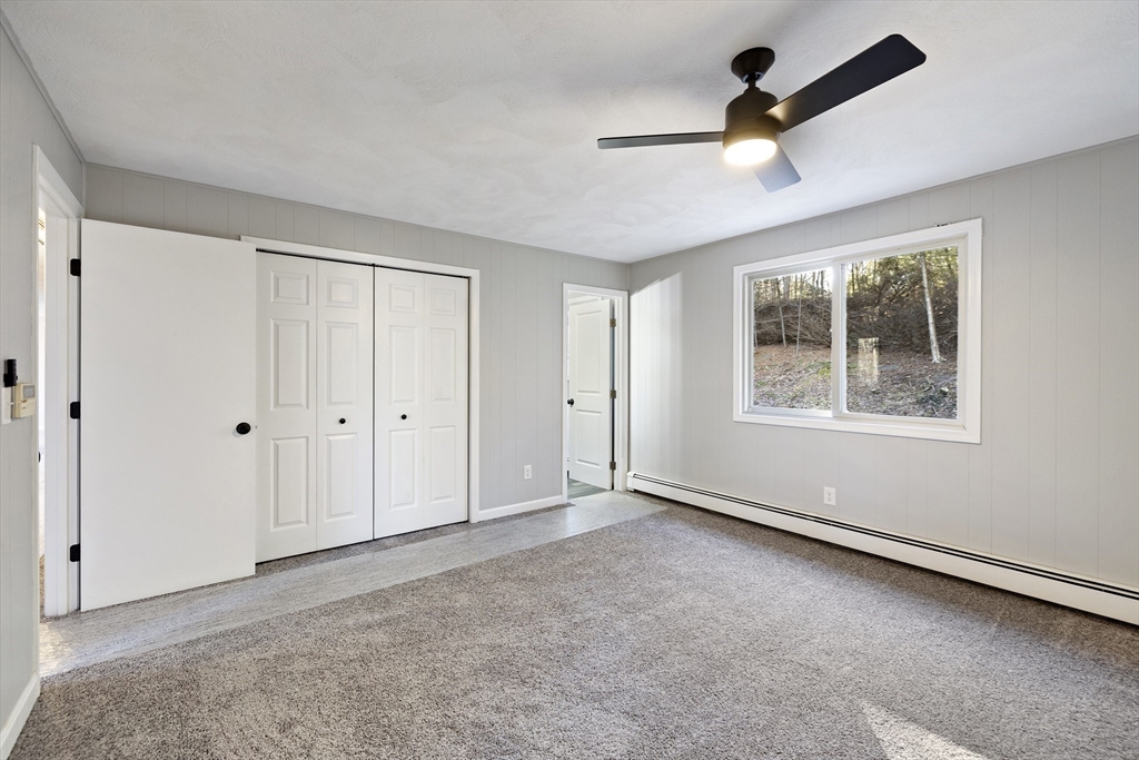 28 Long Hill Road Brookfield, MA 01506 - Photo 19 of 37 a view of an empty room with a window