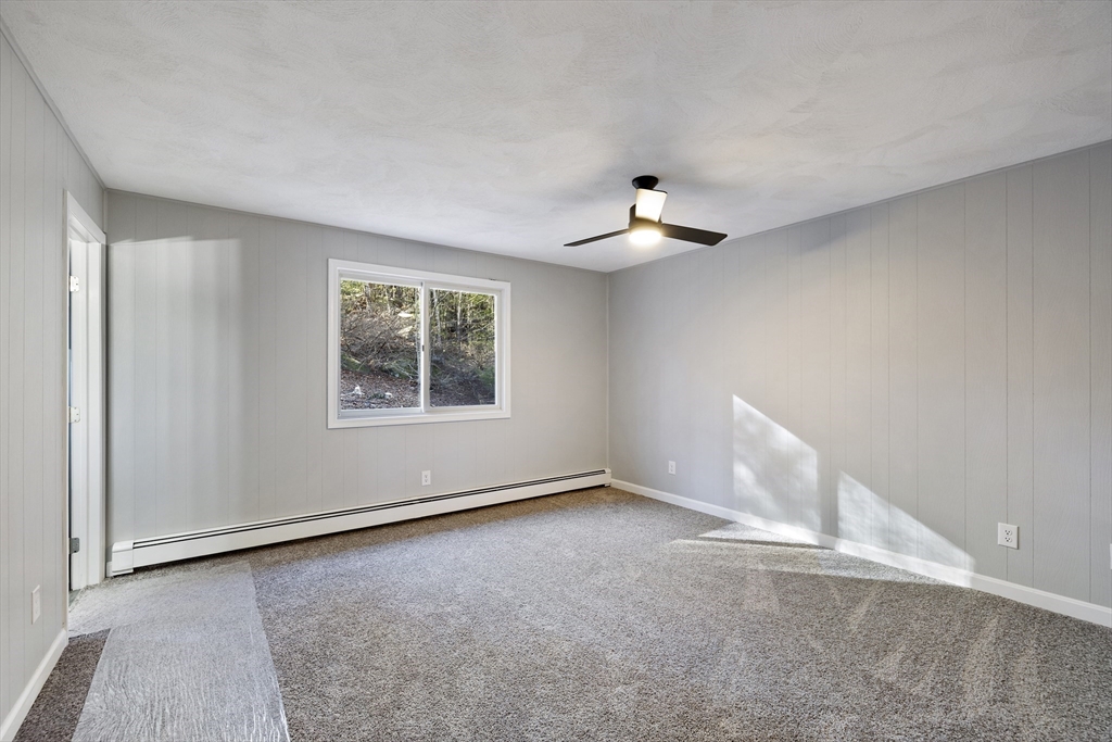 28 Long Hill Road Brookfield, MA 01506 - Photo 20 of 40 a view of an empty room with a window