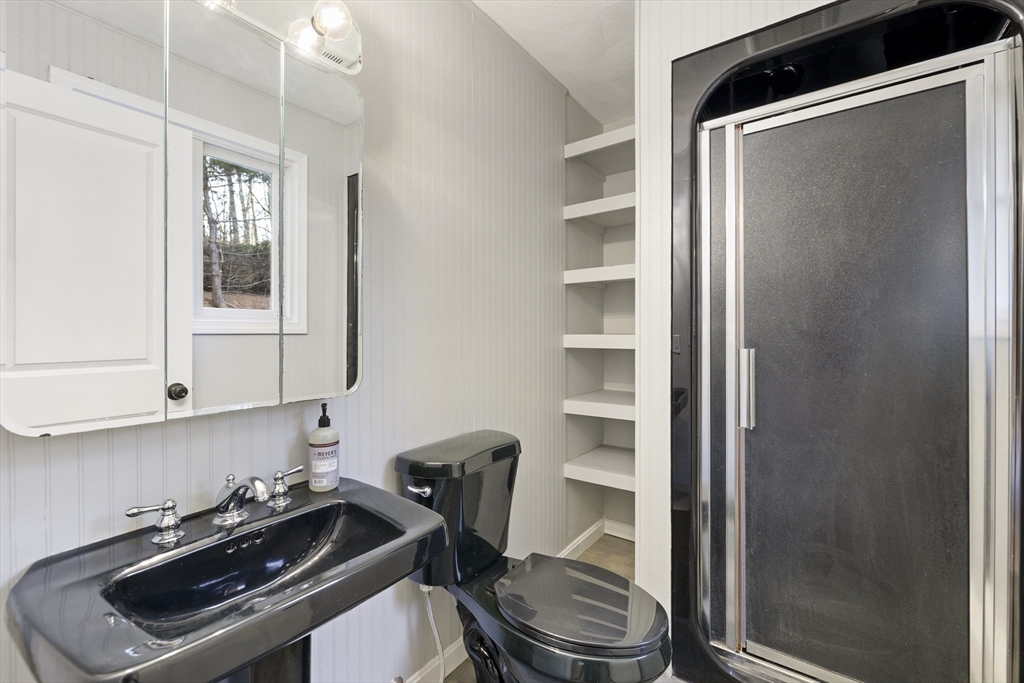28 Long Hill Road Brookfield, MA 01506 - Photo 20 of 37 a bathroom with a sink a toilet and shower