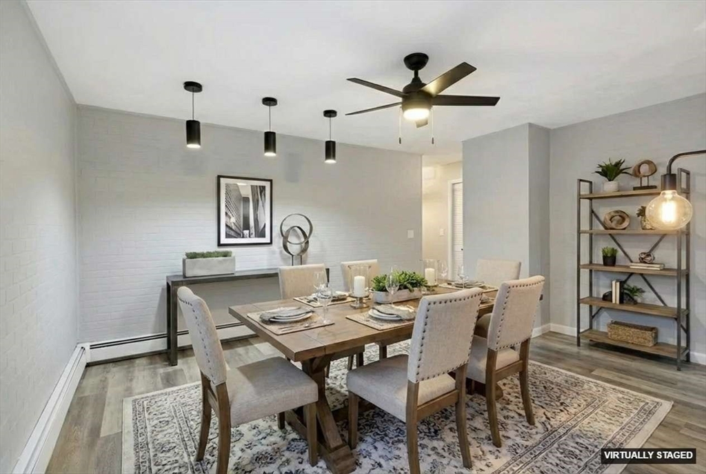 28 Long Hill Road Brookfield, MA 01506 - Photo 2 of 37 a view of a dining room with furniture and a chandelier