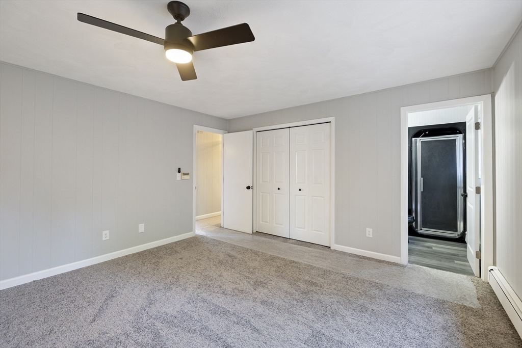 28 Long Hill Road Brookfield, MA 01506 - Photo 21 of 40 a view of an empty room and chandelier fan