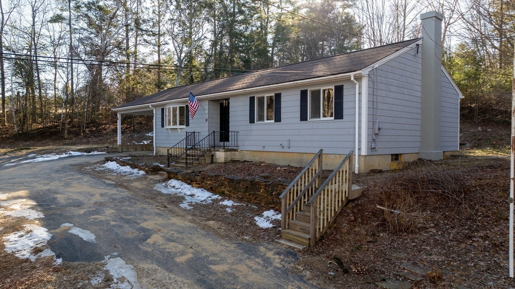 28 Long Hill Road Brookfield, MA 01506 - Photo 24 of 37 a view of a yard in front of a house with large tree