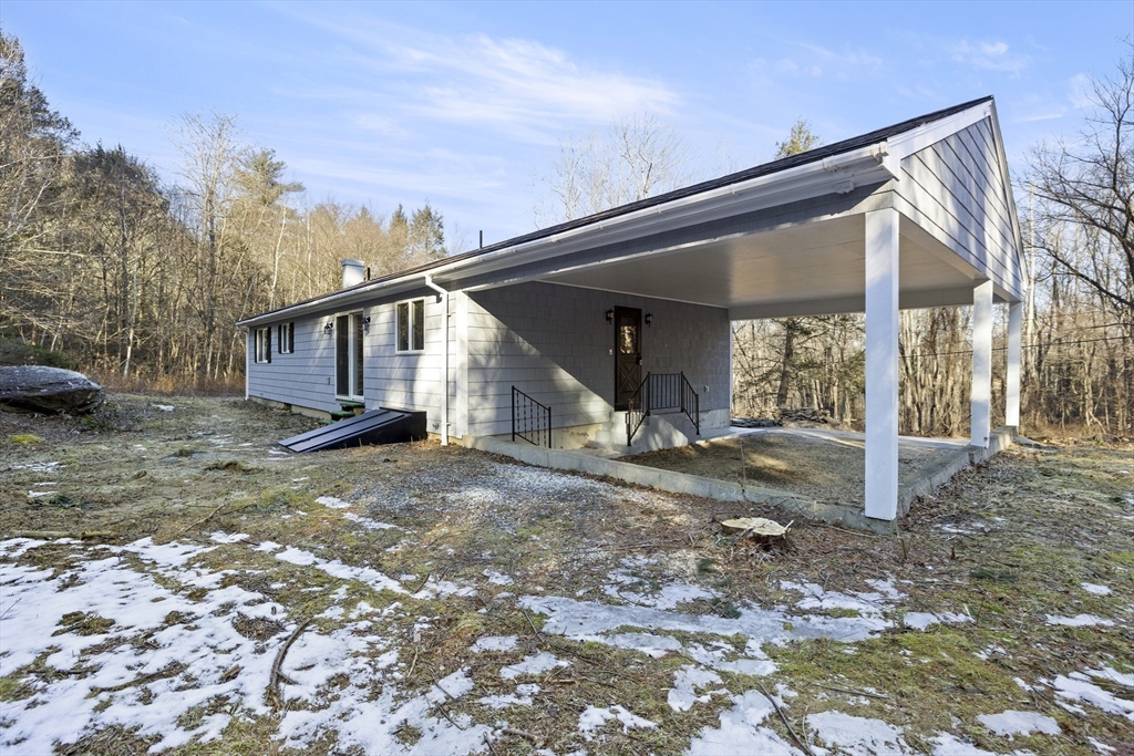 28 Long Hill Road Brookfield, MA 01506 - Photo 36 of 37 a view of a house with a yard