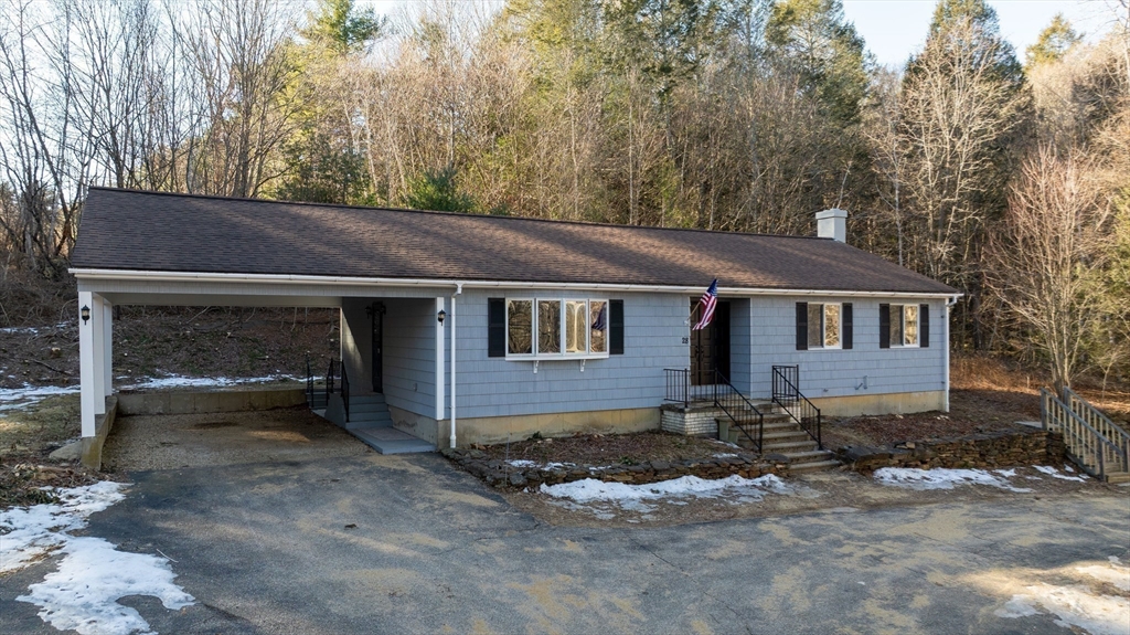 28 Long Hill Road Brookfield, MA 01506 - Photo 4 of 37 a view of a house with a yard