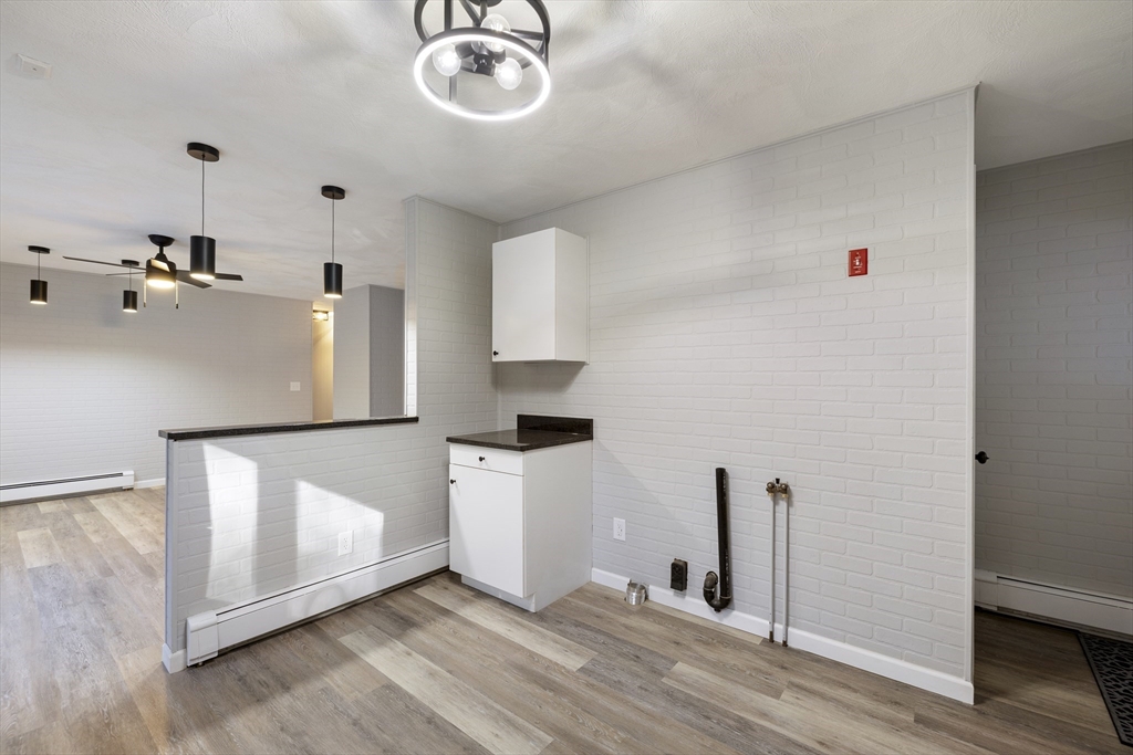 28 Long Hill Road Brookfield, MA 01506 - Photo 5 of 40 a view of a livingroom with wooden floor