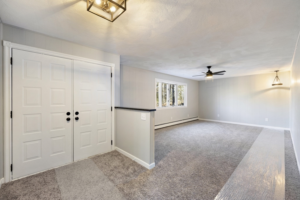 28 Long Hill Road Brookfield, MA 01506 - Photo 9 of 37 an empty room with windows and closet