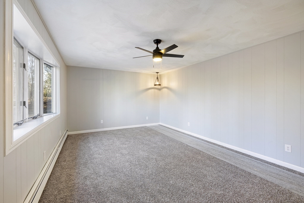 28 Long Hill Road Brookfield, MA 01506 - Photo 10 of 37 wooden floor in an empty room with a window