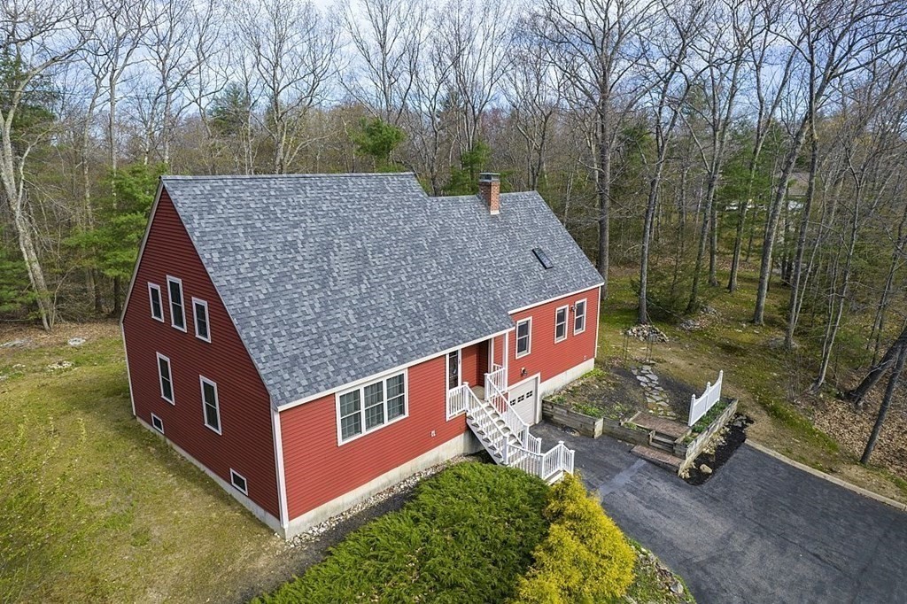 23 Town Farm Road Brookfield, MA 01506 - Photo 5 of 32 an aerial view of a house with backyard and trees