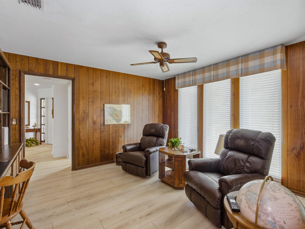 314 Torrey Pines Point Naples, FL 34113 - Photo 17 of 21 a living room with furniture and a large window