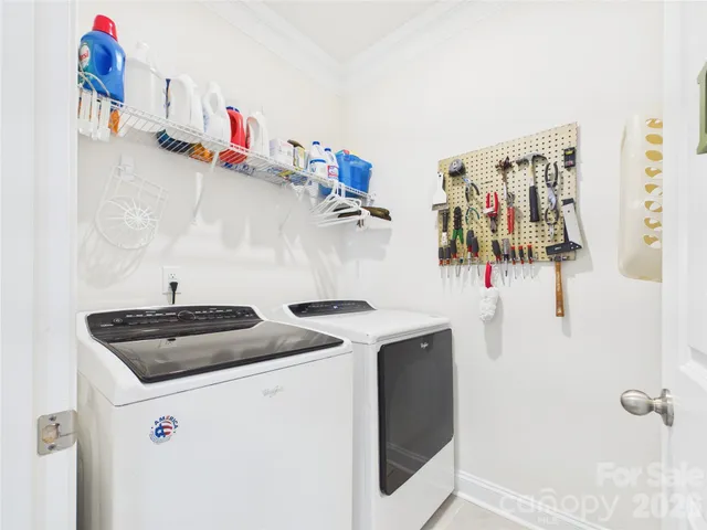 a kitchen with a stove and cabinets