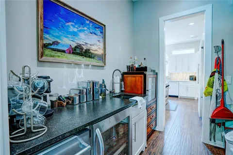 a view of a living room and dining room