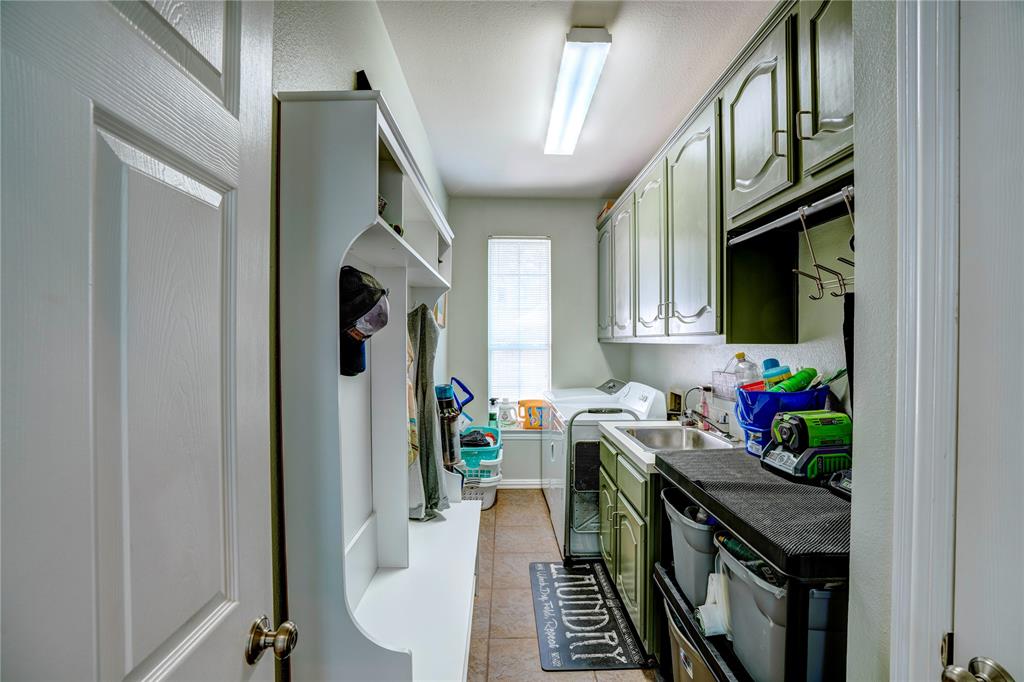 800 Woodcrest Court Southlake, TX 76092 - Photo 21 of 40 a view of a hallway with workspace and windows