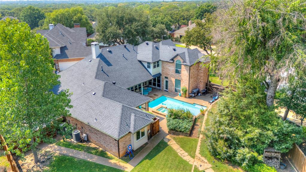 800 Woodcrest Court Southlake, TX 76092 - Photo 35 of 40 an aerial view of a house with a garden