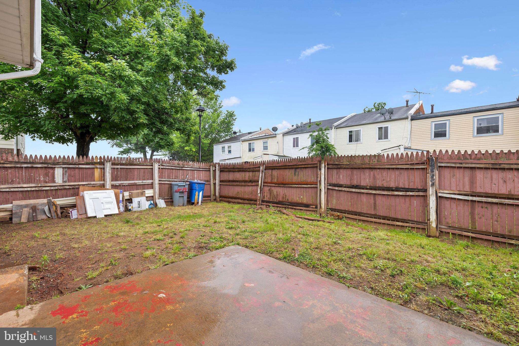 8157 Community Drive Manassas, VA 20109 - Photo 35 of 37 a view of a house with wooden fence