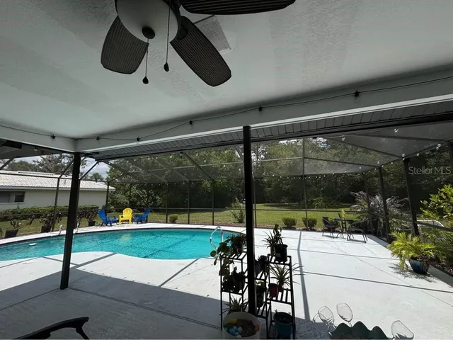 a room with gym equipment and a fireplace