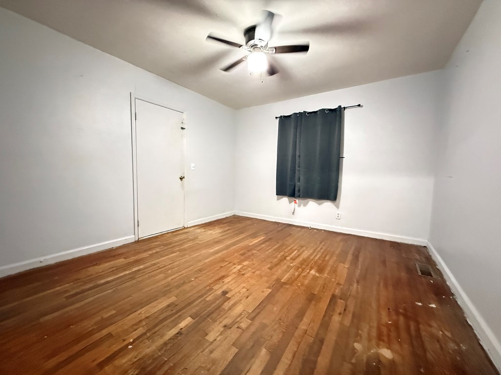 4221 Adams Street Columbus, GA 31907 - Photo 12 of 17 wooden floor in an empty room