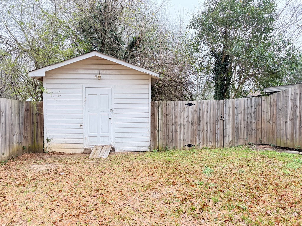 4221 Adams Street Columbus, GA 31907 - Photo 17 of 17 a front view of a house with a yard