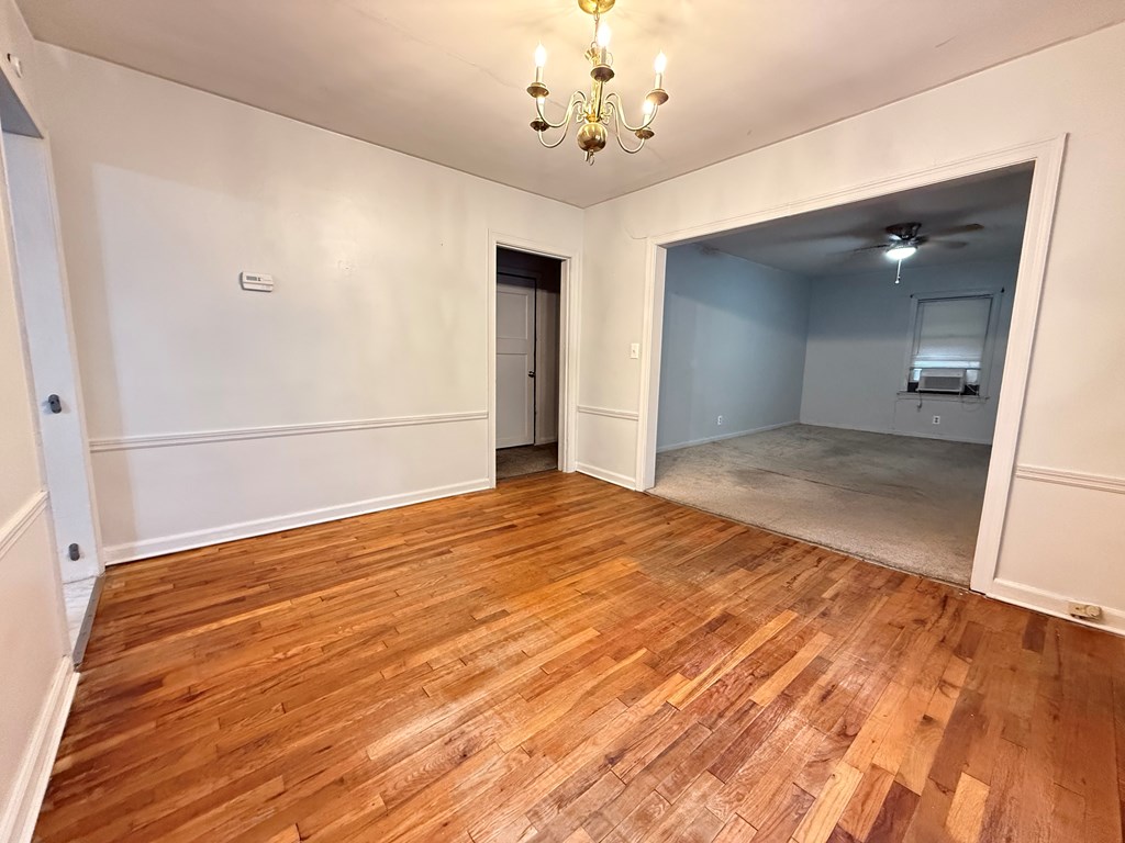 4221 Adams Street Columbus, GA 31907 - Photo 8 of 17 a view of empty room with wooden floor