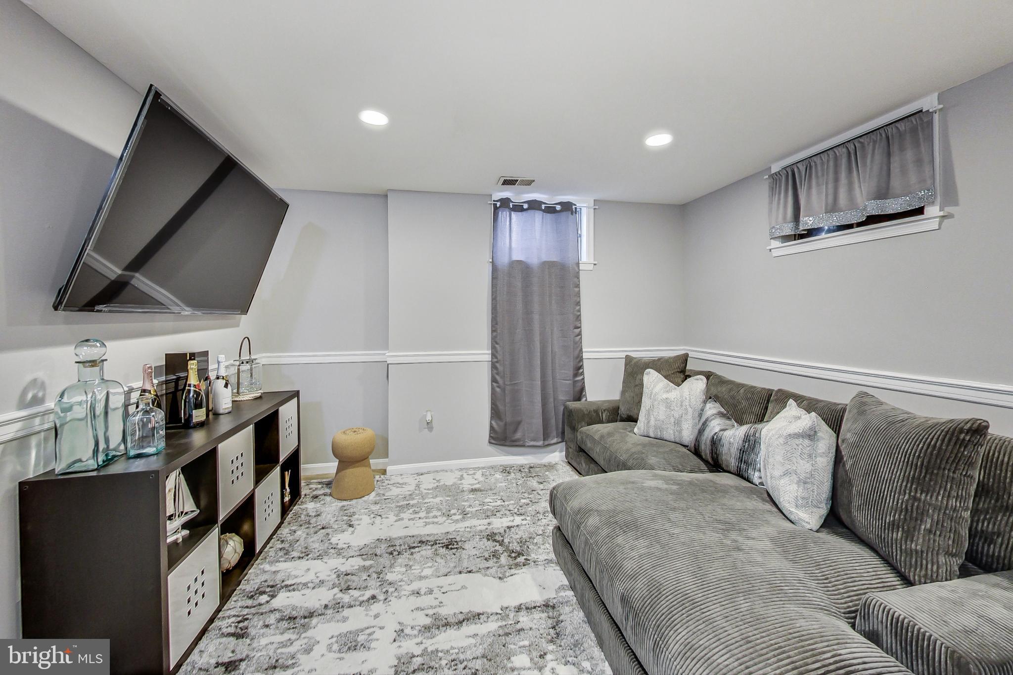 7903 Gambrill Court Springfield, VA 22153 - Photo 24 of 38 Fully finished basement with half bath & laundry