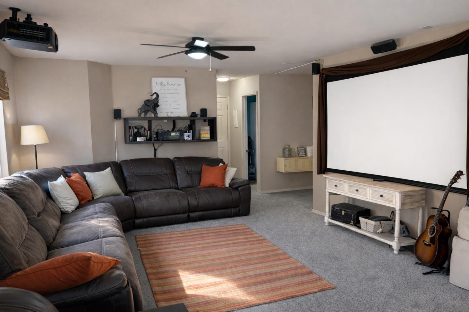 1805 Patton Drive Modesto, CA 95356 - Photo 12 of 15 a living room with furniture and a flat screen tv