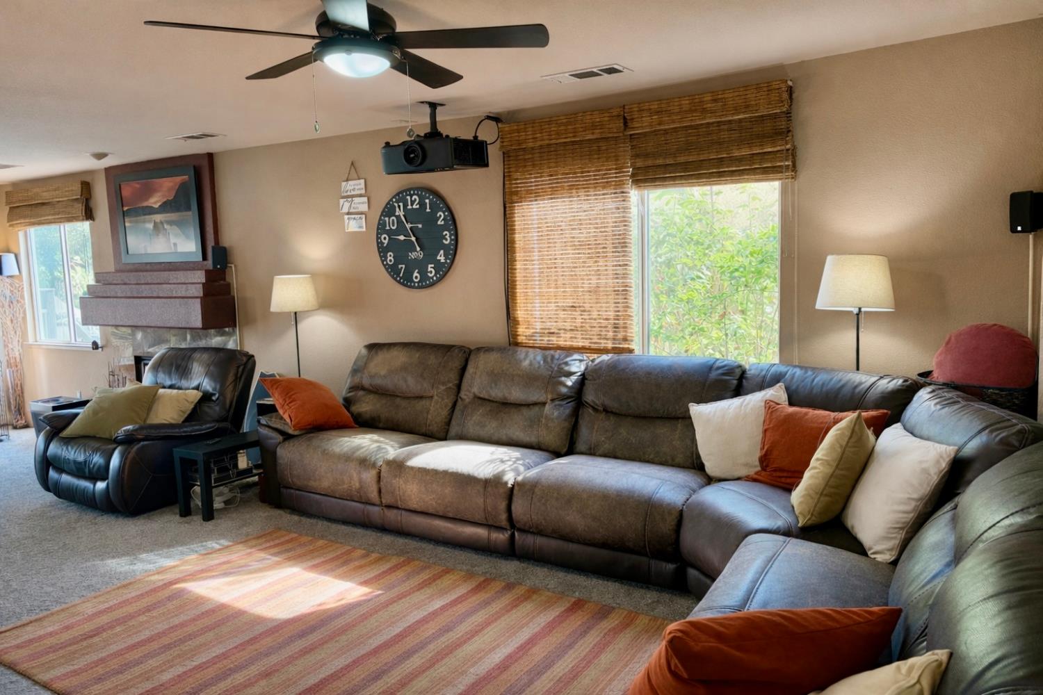 1805 Patton Drive Modesto, CA 95356 - Photo 13 of 15 a living room with furniture a lamp and a window