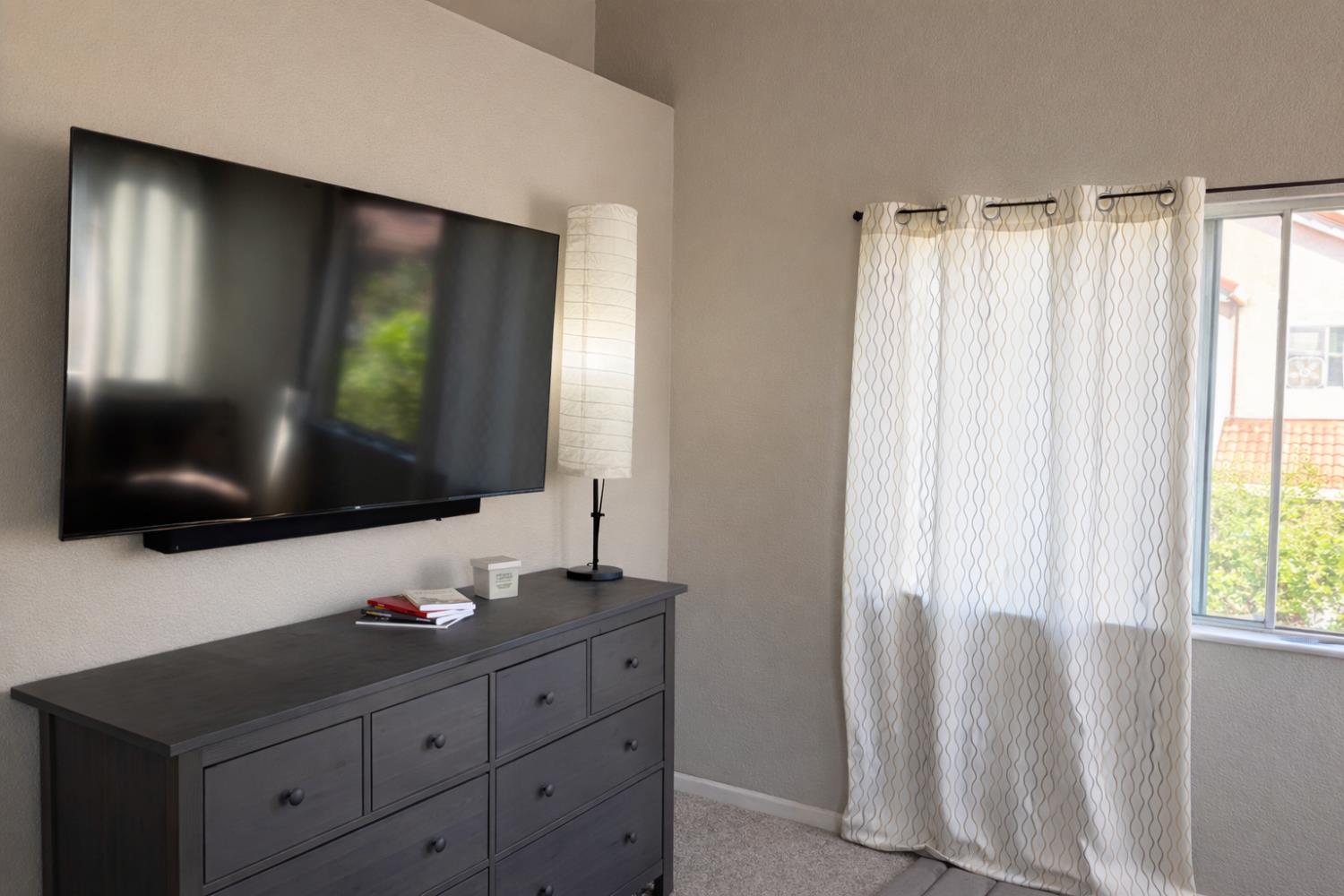 1805 Patton Drive Modesto, CA 95356 - Photo 7 of 15 a bathroom with a double vanity sink and mirror